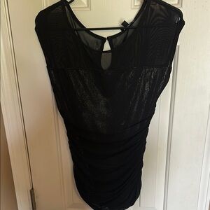 bebe Shimmery Black Top with mesh detailing and loop snap back